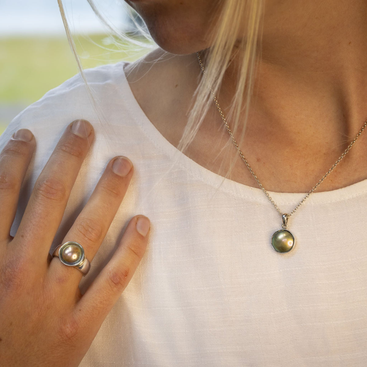 Pearl ring nz showcasing rare Arapawa blue paua pearl
