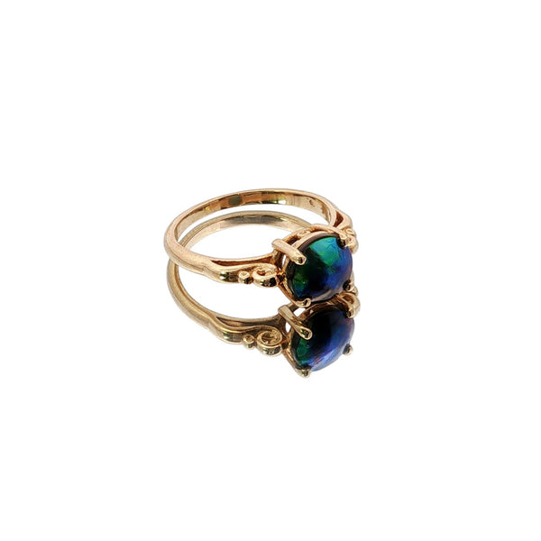 Pearl ring nz handcrafted with rare paua pearl in polished yellow gold solitaire setting
