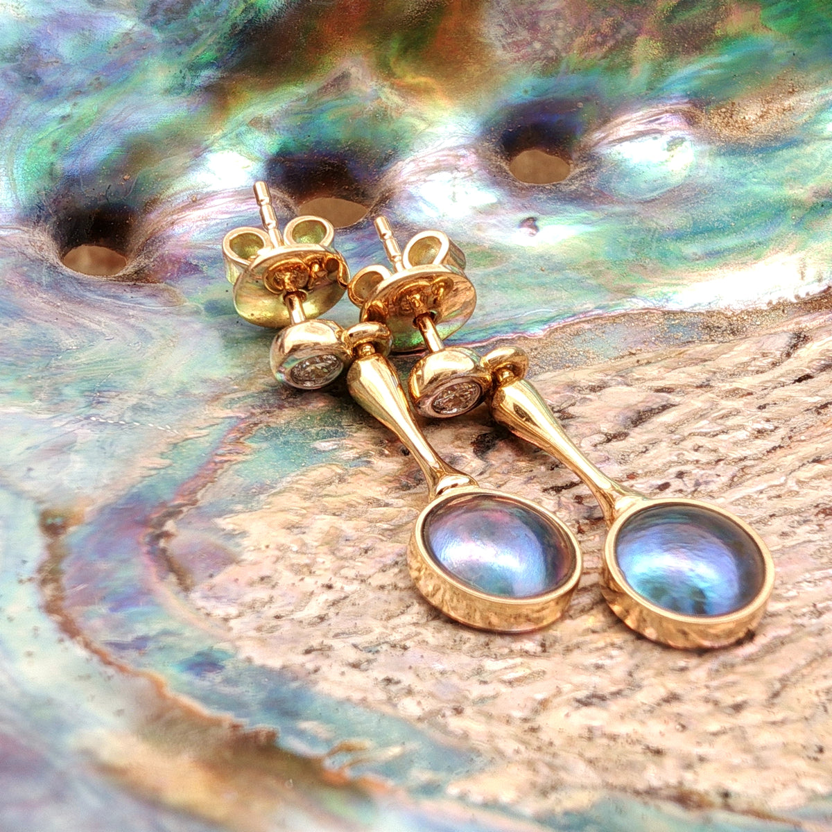Pearl earrings nz with 7mm round paua pearls in polished gold
