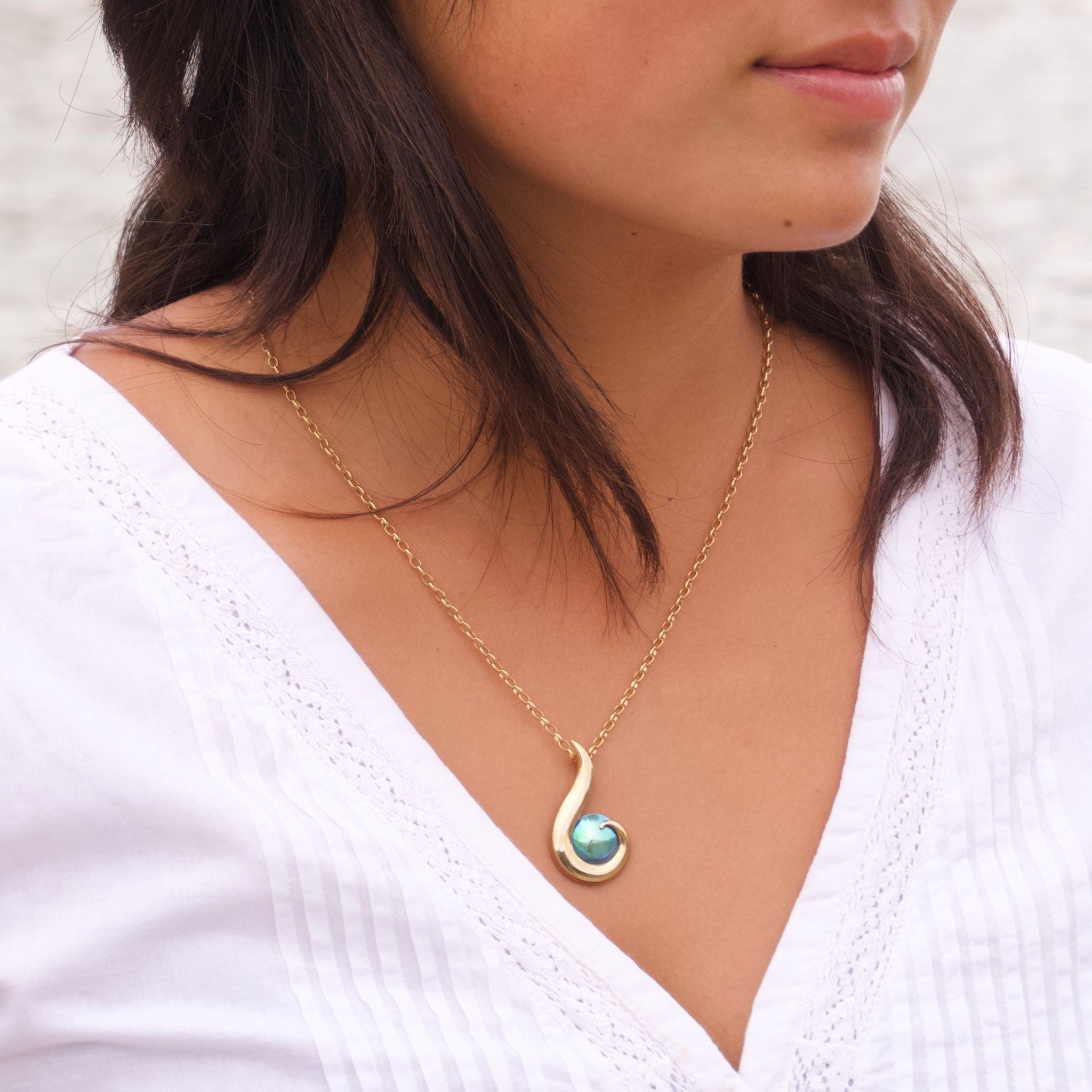 May birthpearl necklace featuring natural New Zealand paua pearl in elegant setting
