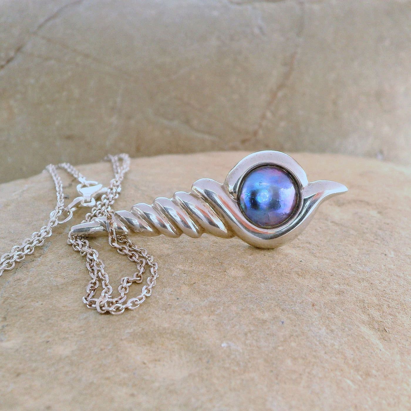 7. Pearl Narwhal Necklace  - July Flame Pearl