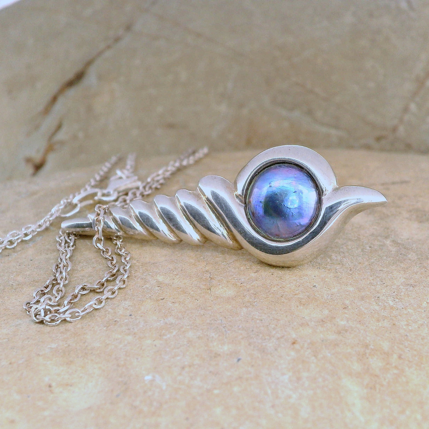 7. Pearl Narwhal Necklace  - July Flame Pearl